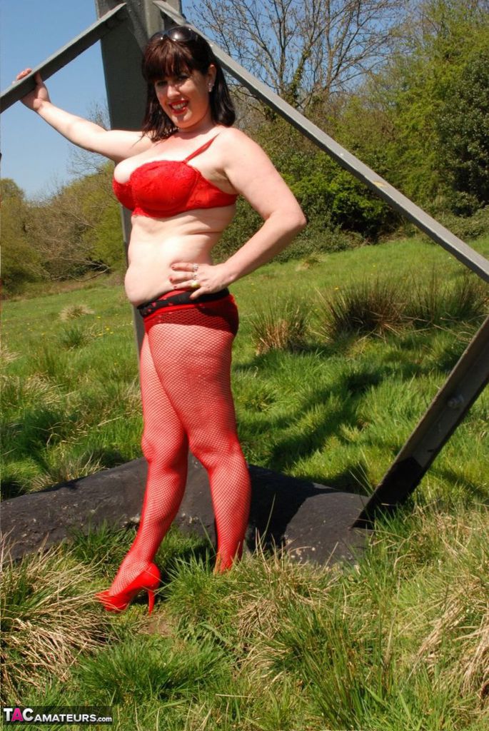 UK amateur Juicey Janey gets naked in heels underneath a hydro tower  